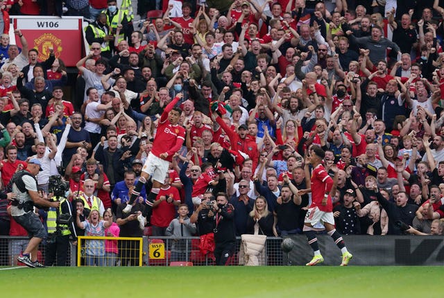 Cristiano Ronaldo, left, celebrates his second goal