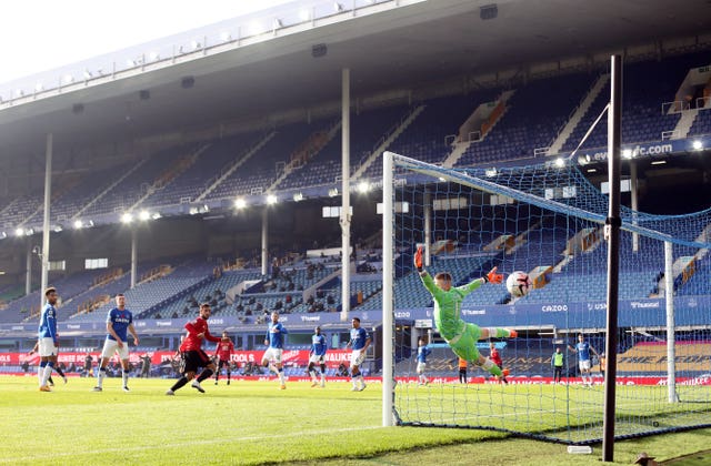 Bruno Fernandes, centre left, equalises against Everton