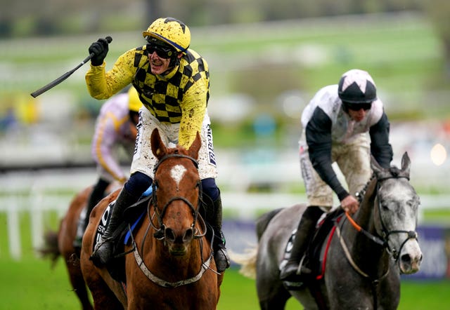 Paul Townend celebrates winning the Champion Hurdle at Cheltenham on State Man