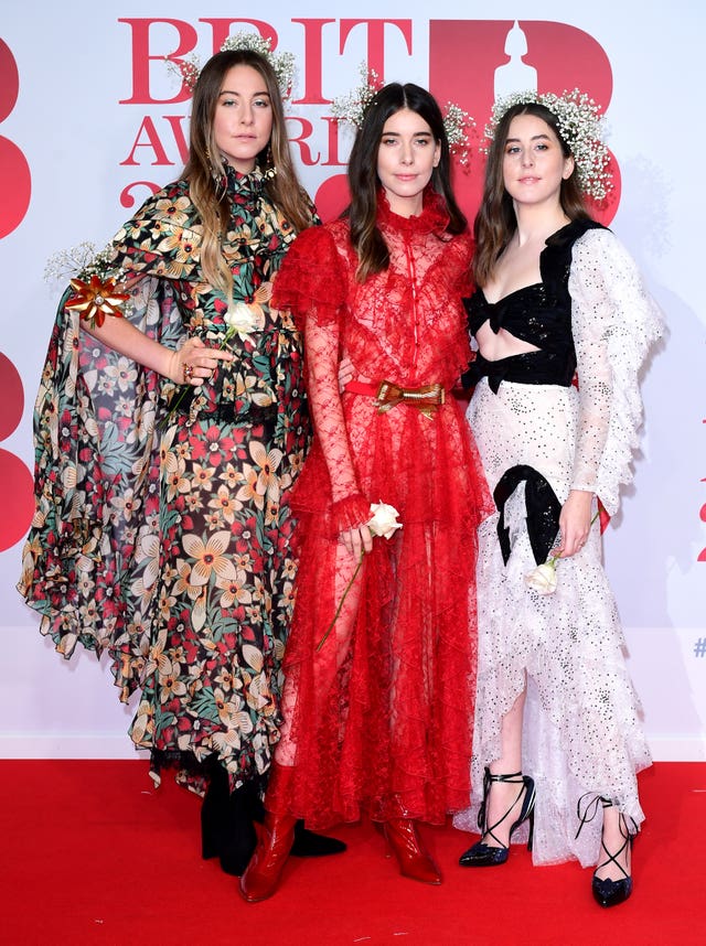 Haim's Este, Danielle and Alana take to the red carpet (Ian West/PA)