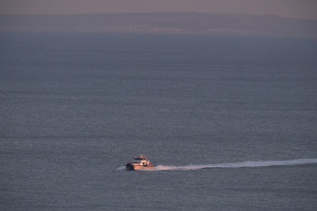 A group of people thought to be migrants are brought into the Border Force compound in Dover, Kent, by a Border Force vessel following a small boat incident in the Channel