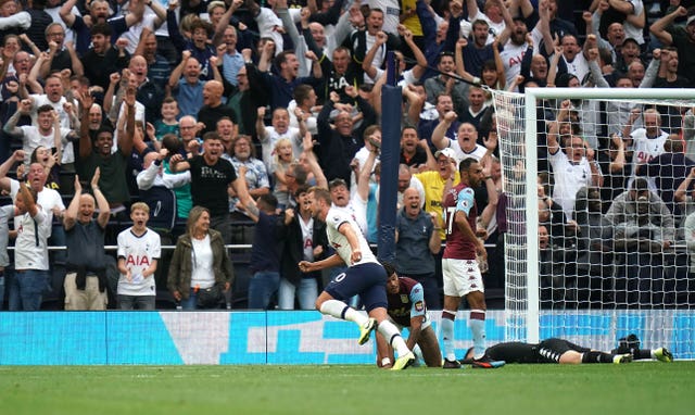 Harry Kane, centre, scored a late double to help Tottenham to a 3-1 win at home to Aston Villa