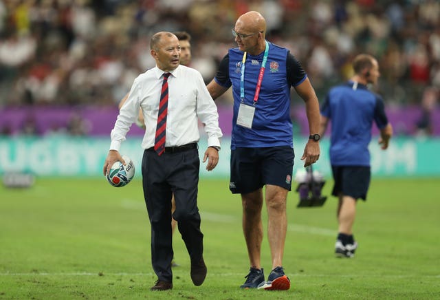 John Mitchell (right) is to stay with England until 2021