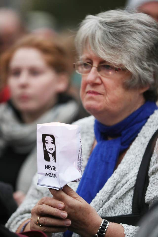 A woman holds a candle as the coalition to repeal the Eighth Amendment hold a vigil to mark the fifth anniversary of the death of Savita Halappanavar, who died after she was denied a medically recommended abortion following a miscarriage, at the GPO on Dublin's O'Connell Street. (Niall Carson/PA)
