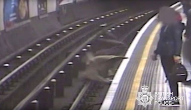Sir Robert Malpas said he felt himself 'flying' on to the rails