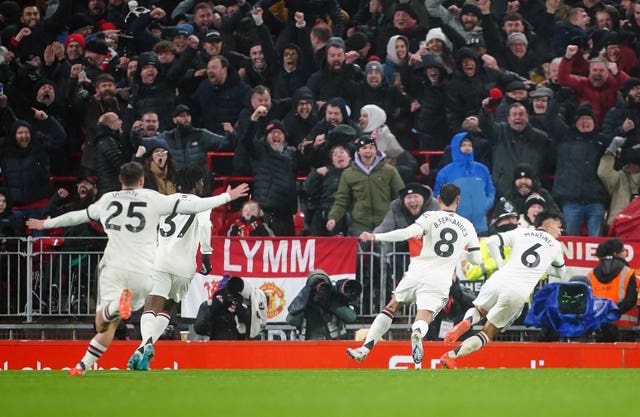 Lisandro Martinez celebrates scoring against Liverpool last season
