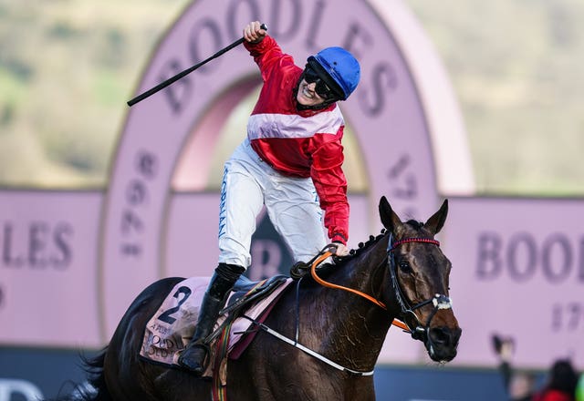 Rachael Blackmore celebrates on A Plus Tard after winning the Boodles Cheltenham Gold Cup