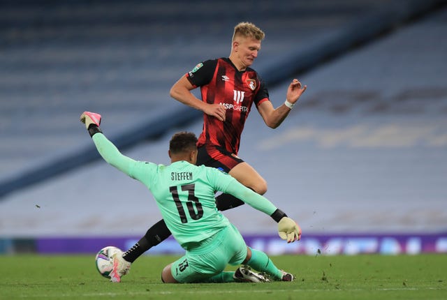 City goalkeeper Zack Steffen makes a save from Sam Surridge 