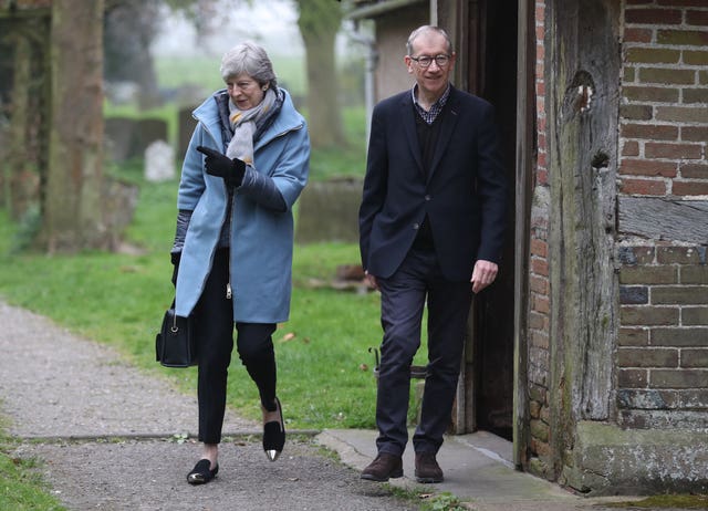 Theresa May attends church