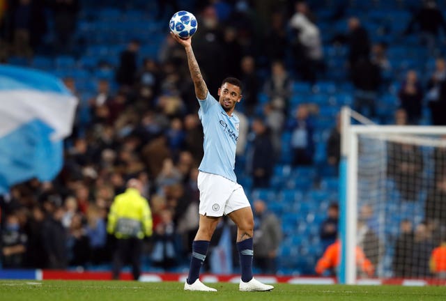 Manchester City's Gabriel Jesus celebrates with the matchball