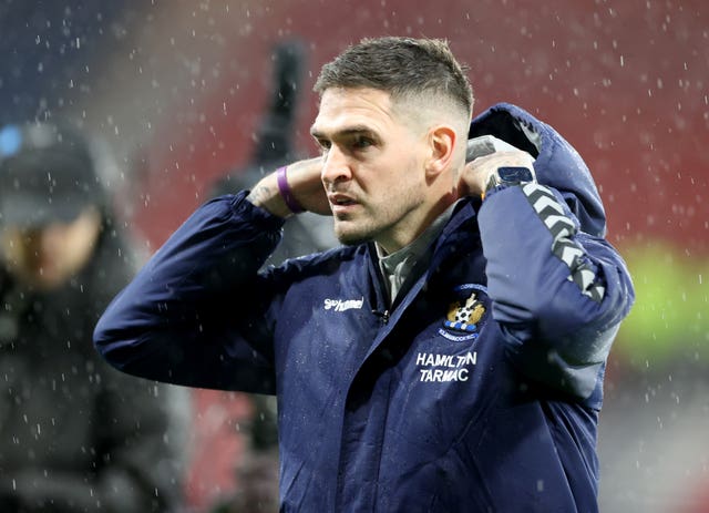 Kyle Lafferty arrives at the ground before the game