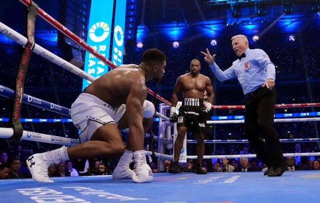 Anthony Joshua gets up to his feet after being knocked down by Daniel Dubois