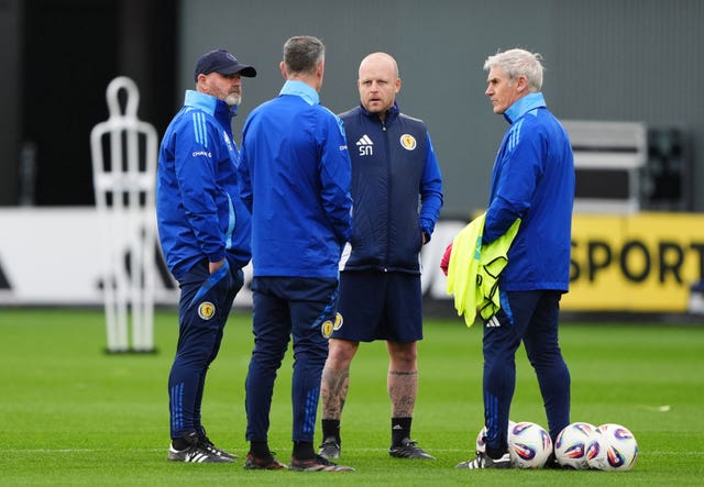 (left to right) Scotland manager Steve Clarke, set-piece coach Andrew Hughes, assistant coaches Naismith and Alan Irvine during a training session at Lesser Hampden