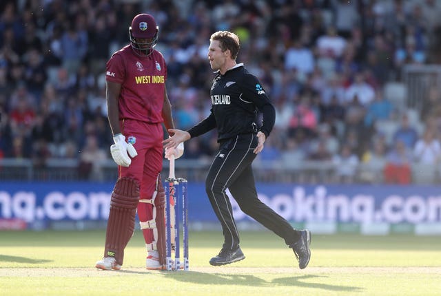Lockie Ferguson, right, celebrates the dismissal of West Indies captain Jason Holder