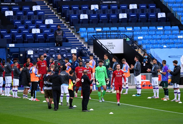 Manchester City form a guard of honour for newly-crowned Premier League champions Liverpool