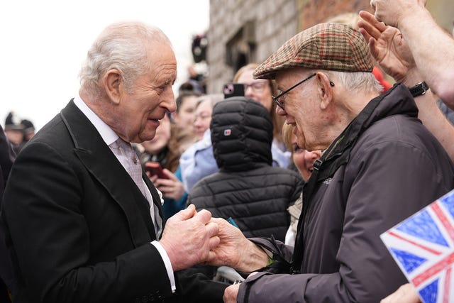 The King speaks to well-wishers