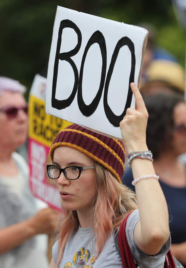 Demonstrator protesting against the Mr Trump's visit