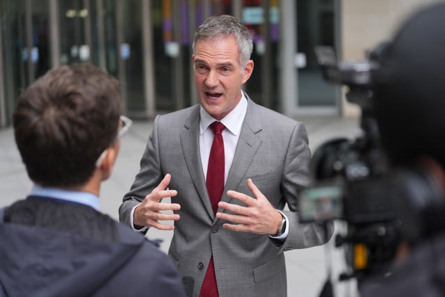 Business and Trade Secretary Peter Kyle speaks to the media outside BBC Broadcasting House in London, after appearing on the BBC One current affairs programme, Sunday with Laura Kuenssberg