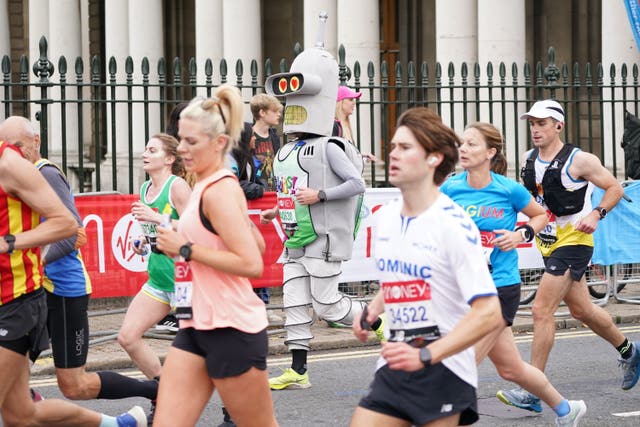A runner dressed as Bender the robot