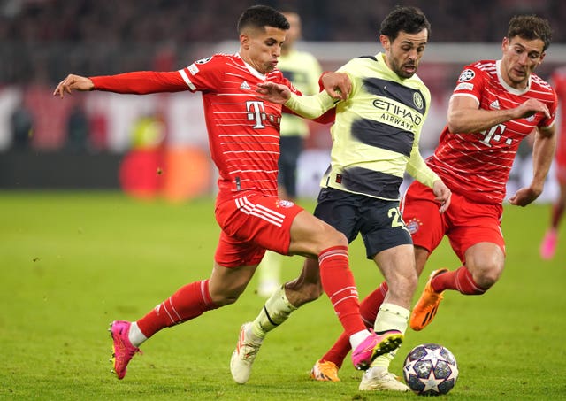 Joao Cancelo (left) plays against Manchester City for Bayern Munich