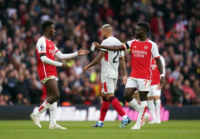 Eddie Nketiah is handed the captain''s armband by Bukayo Saka