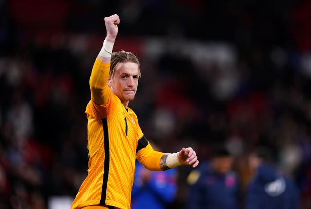 Jordan Pickford acknowledges the England fans