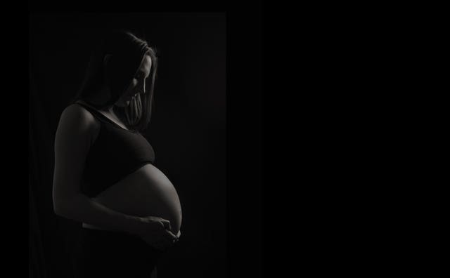 A pregnant woman at eight months