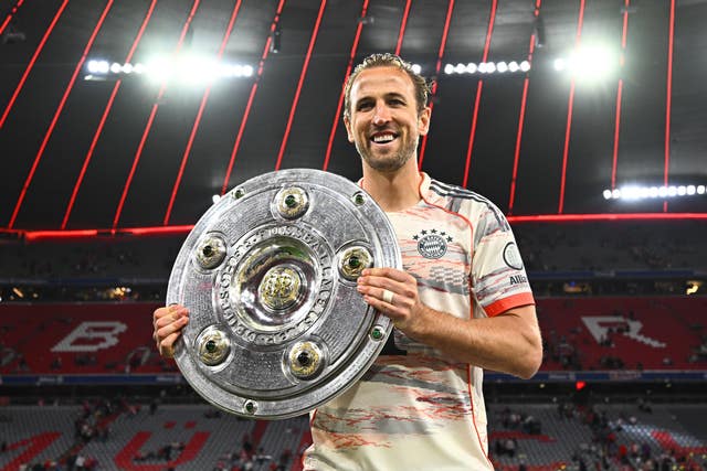 Bayern Munich’s Harry Kane with The Bundesliga Meisterschale