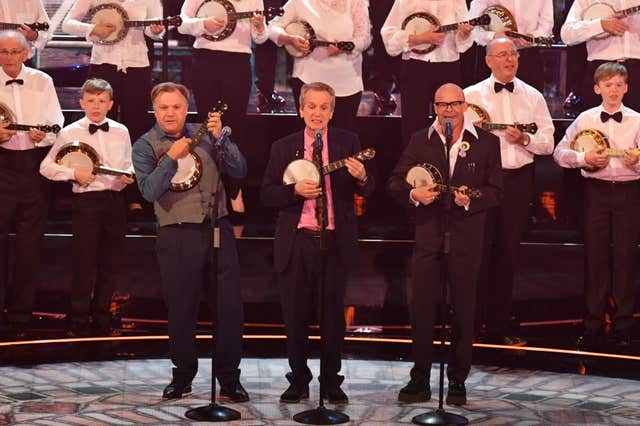 Ed Balls, Frank Skinner and Harry Hill perform for the Queen (John Stillwell/PA)