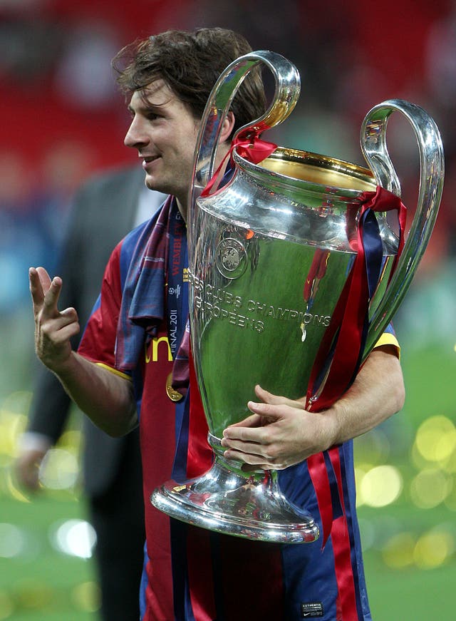 Lionel Messi with the Champions League trophy in 2011