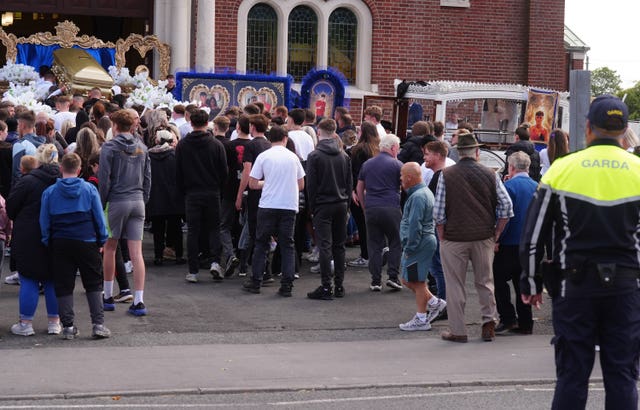 The coffin is carried into St Michael the Archangel Church in Athy