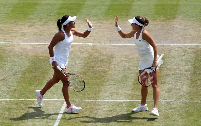Heather Watson , left and Tatjana Maria were beaten in the women's doubles