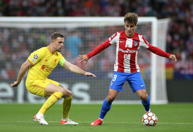 Antoine Griezmann (right) in action for Atletico Madrid