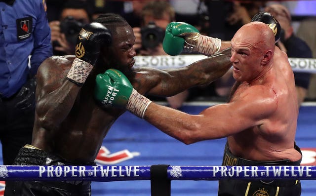 Tyson Fury (right) beat Deontay Wilder to claim the WBC heavyweight title.