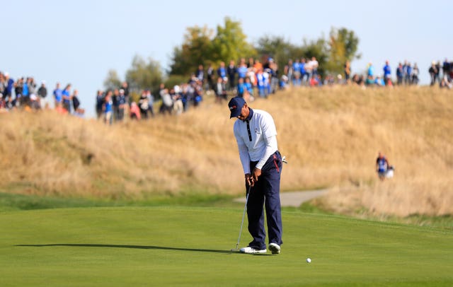 Tiger Woods misses a putt on the eighth 