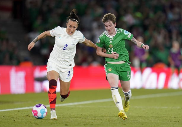 England’s Lucy Bronze, left, and Northern Ireland’s Kirsty McGuinness battle for the ball