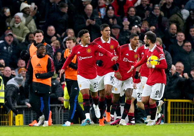 Jadon Sancho celebrates his equaliser