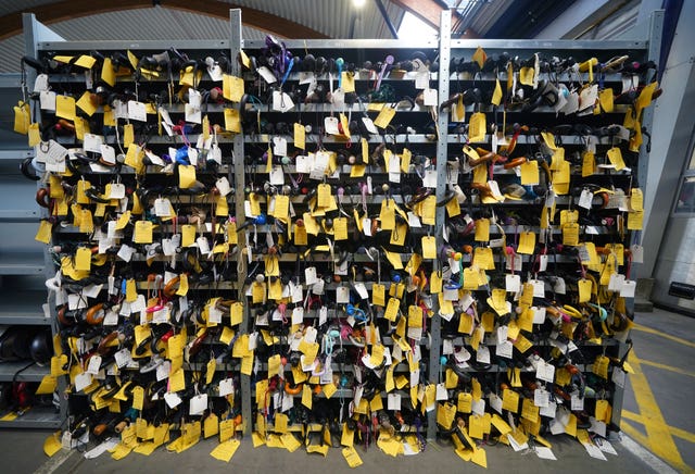 Shelves of umbrellas at TfL's lost property office