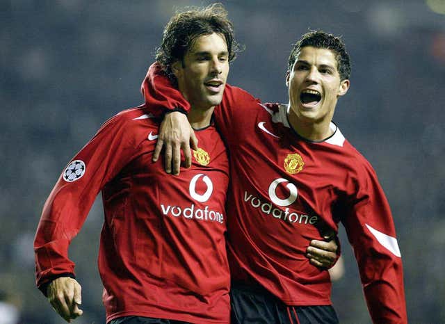Ruud Van Nistelrooy, left, celebrates a Champions League goal with Cristiano Ronaldo