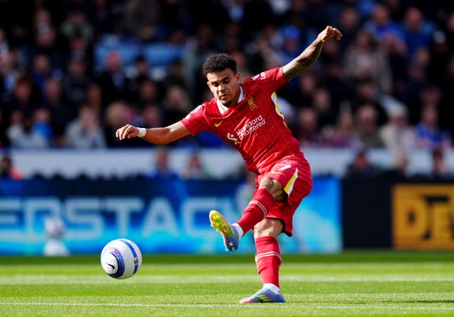 Liverpool’s Luis Diaz takes a shot