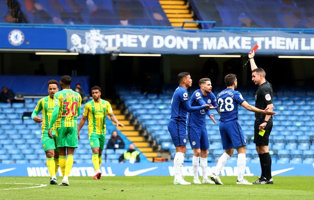 Chelsea defender Thiago Silva is shown a red card