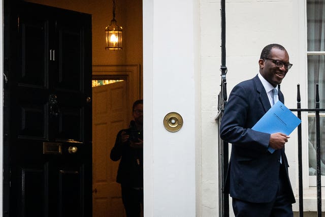 Chancellor of the Exchequer Kwasi Kwarteng leaves 11 Downing Street to make his way to the Treasury Department to deliver his mini-budget