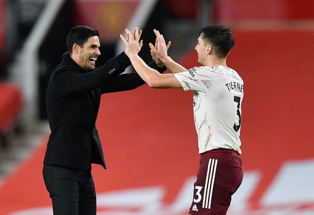 Mikel Arteta celebrates with Kieran Tierney 