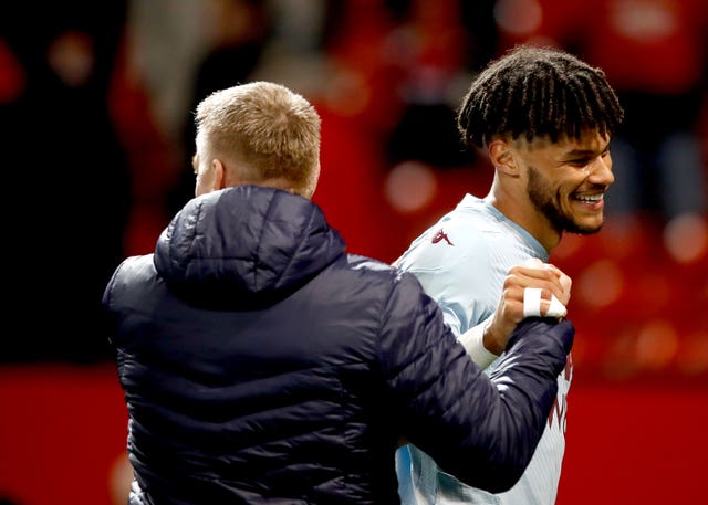 Aston Villa's Tyrone Mings with manager Dean Smith after the final whistle 