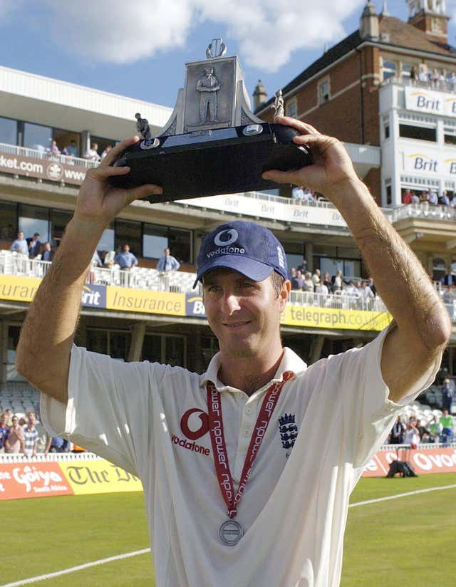 Former England captain holds aloft the Wisden Trophy in 2004.