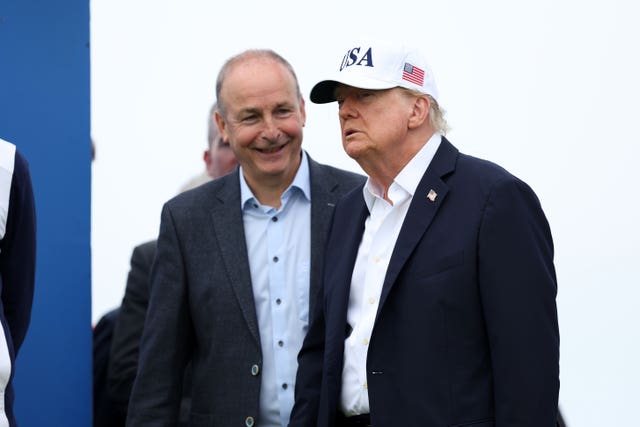 Micheál Martin and Donald Trump talking at the Amgen Irish Open