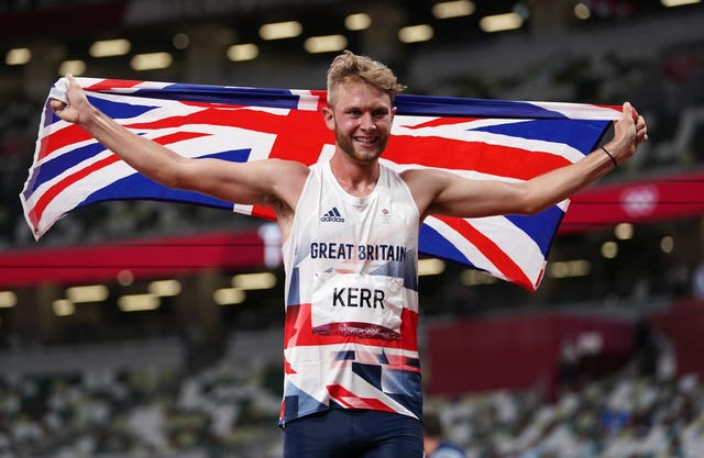 Josh Kerr celebrates