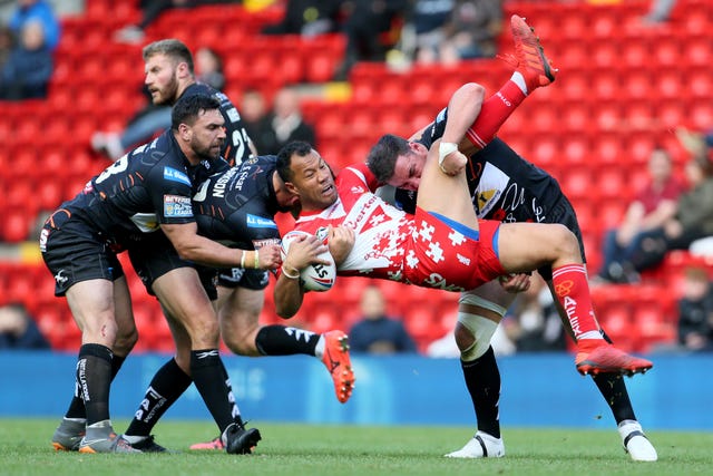 Joseph Paulo gets tackled
