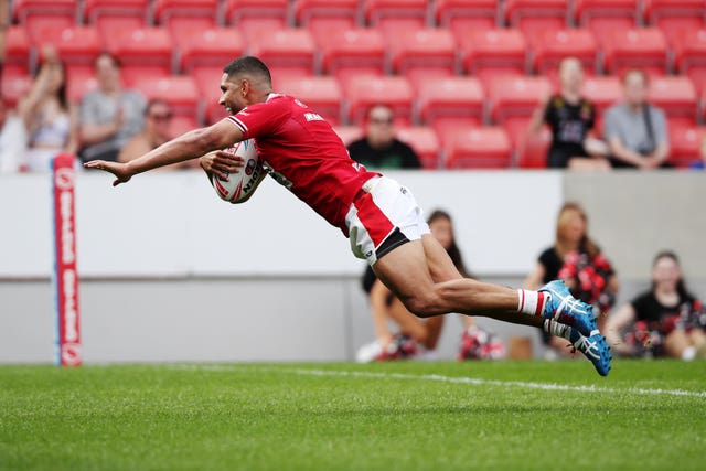 Salford's Nene Macdonald crosses the line against St Helens