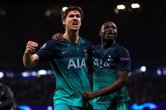 Tottenham Hotspur’s Fernando Llorente and Victor Wanyama (right) celebrate after the final whistle of the Champions League quarter-final 